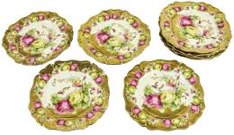 OCHO PLATOS DE POSTRE EN PORCELANA PRIMER TERCIO S.XX