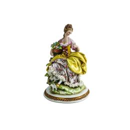 FIGURA EN PORCELANA DE MEDIADOS DEL S.XX