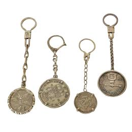 CUATRO LLAVEROS DE PLATA