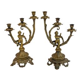 PAREJA DE CANDELEROS EN BRONCE SEGUNDO TERCIO DEL S.XX