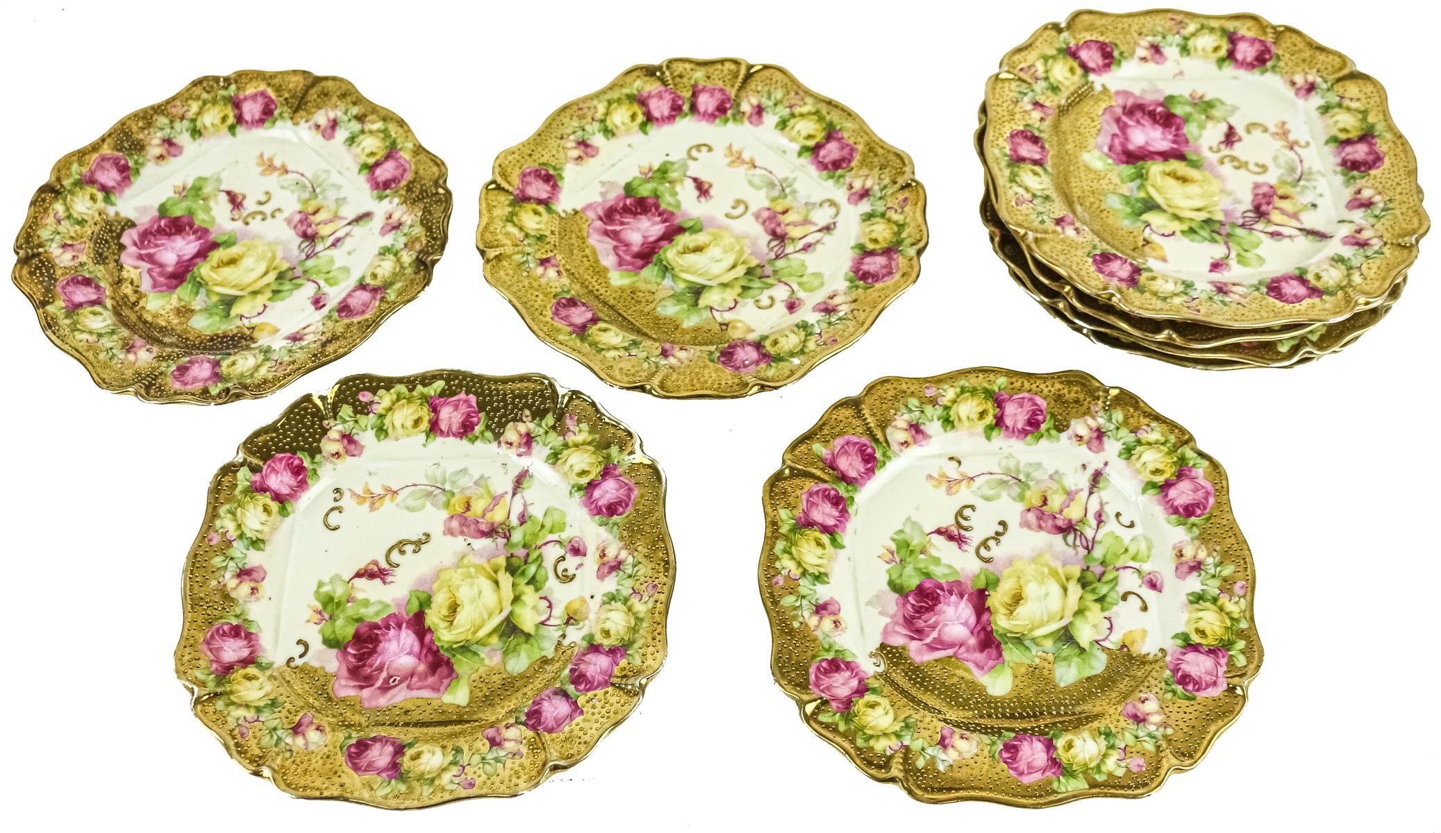 OCHO PLATOS DE POSTRE EN PORCELANA PRIMER TERCIO S.XX