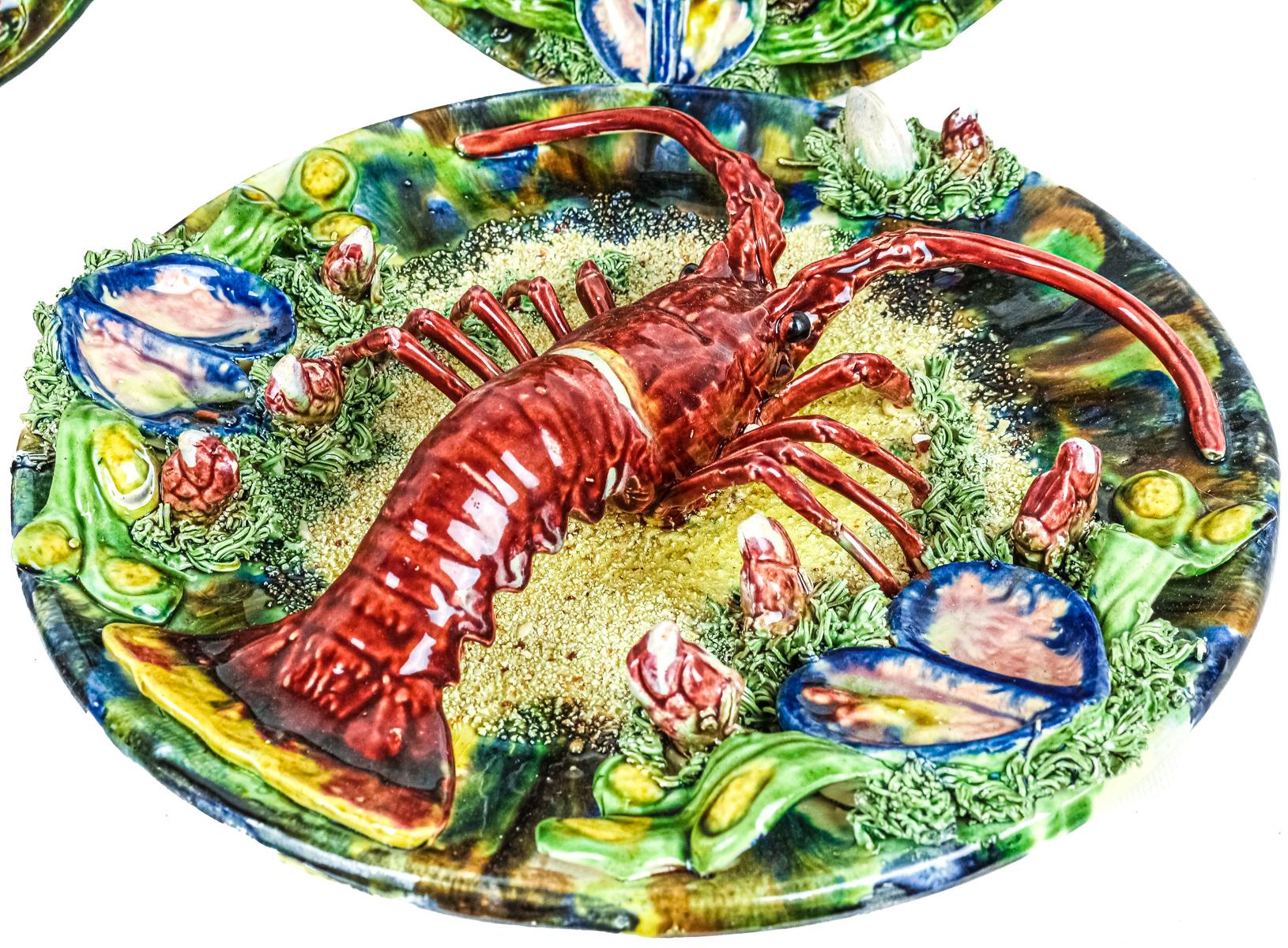 CUATRO PLATOS DECORATIVOS EN CERÁMICA ESMALTADA AÑOS 60