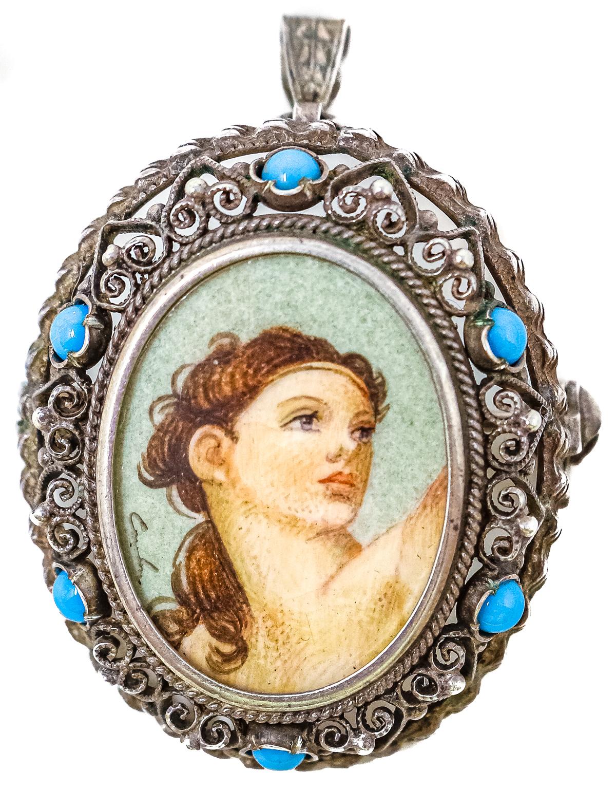 BROCHE COLGANTE CON MINIATURA