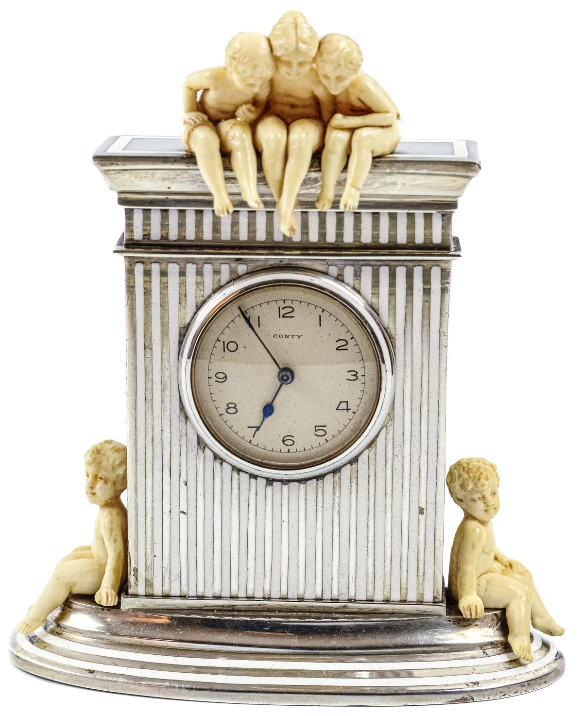 PEQUEÑO RELOJ DE SOBREMESA "CONTY" SEGUNDO CUARTO DEL S.XX