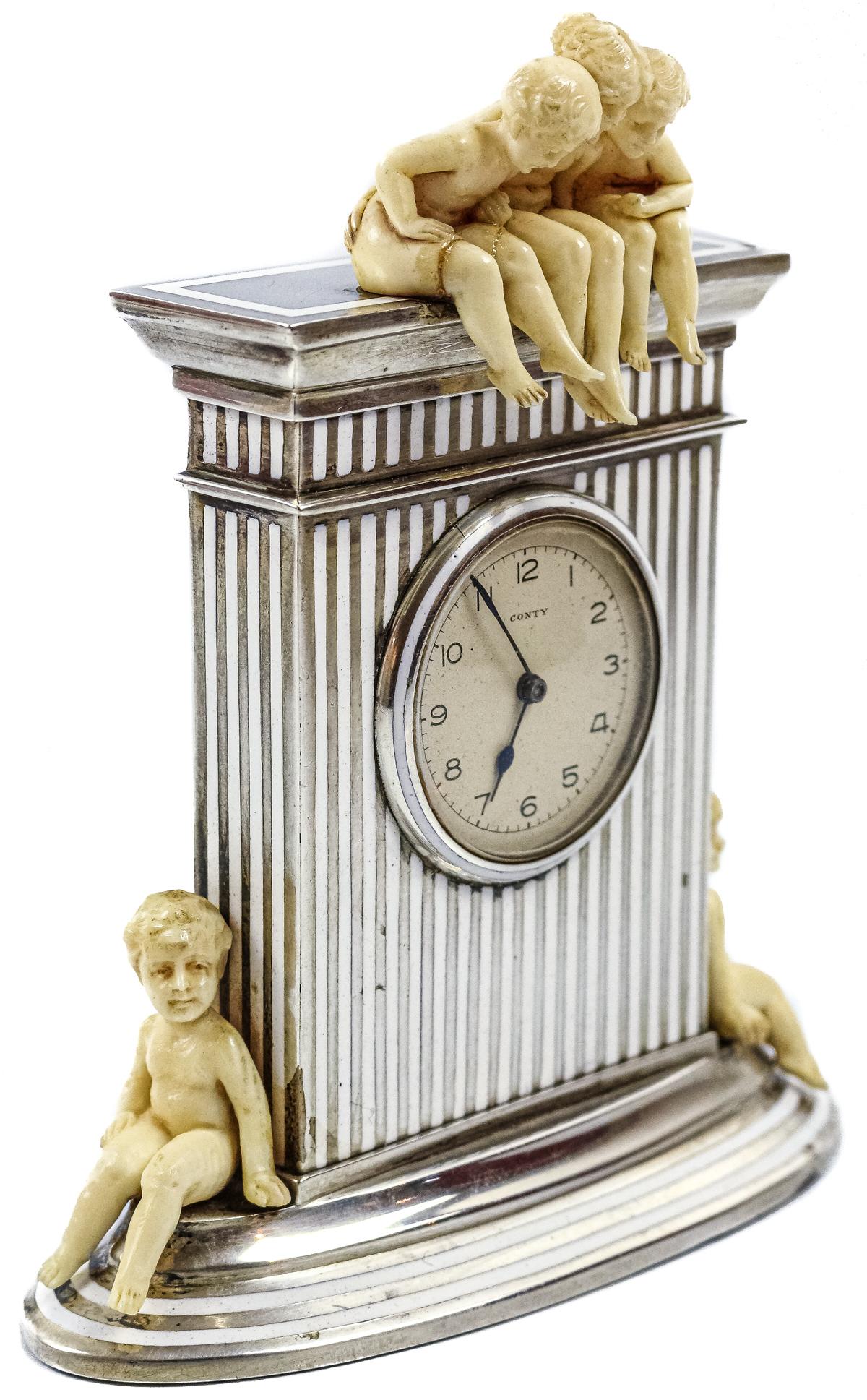 PEQUEÑO RELOJ DE SOBREMESA "CONTY" SEGUNDO CUARTO DEL S.XX