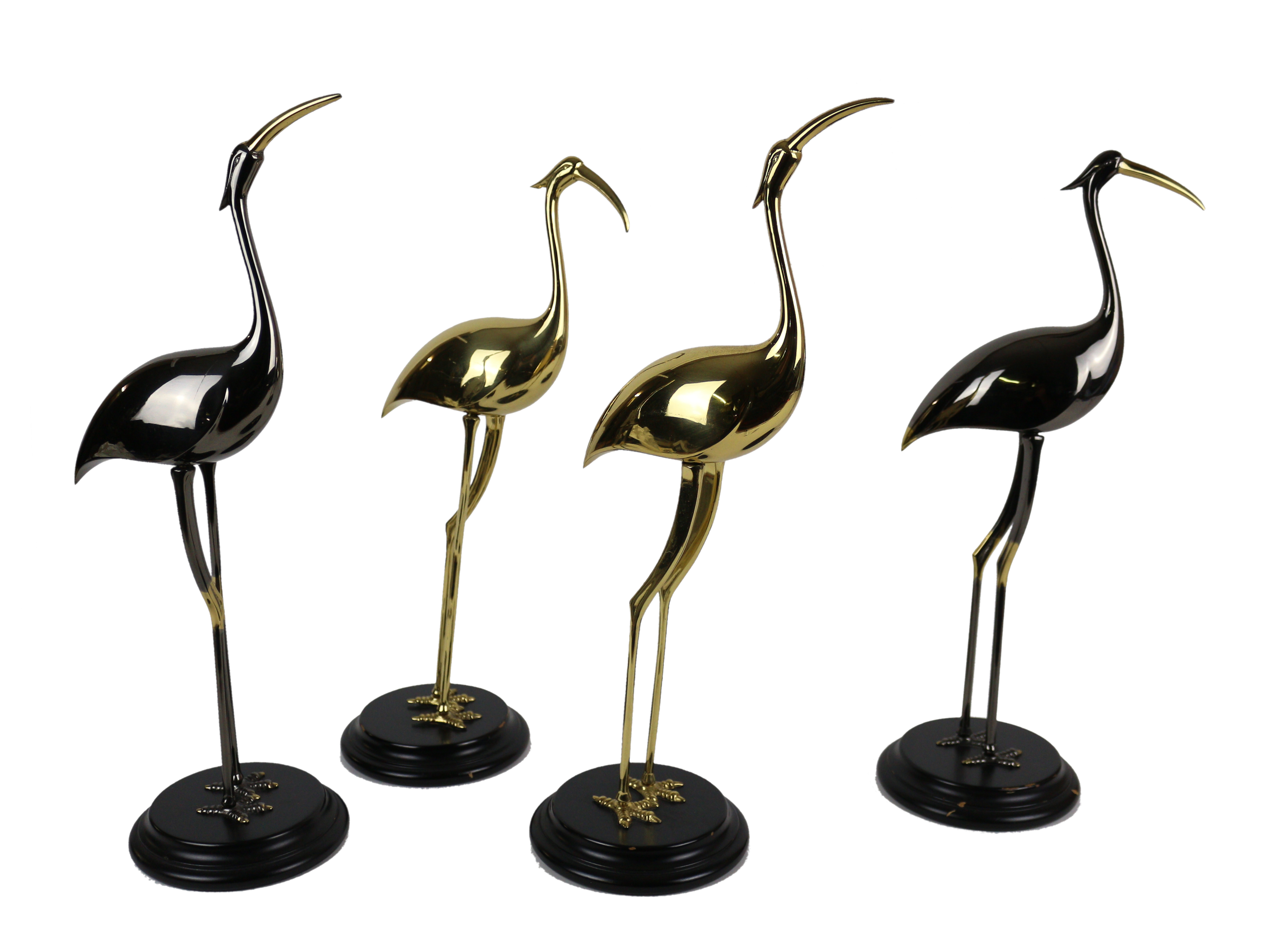 CUATRO FIGURAS DECORATIVAS EN METAL ÚLTIMO CUARTO DEL S.XX