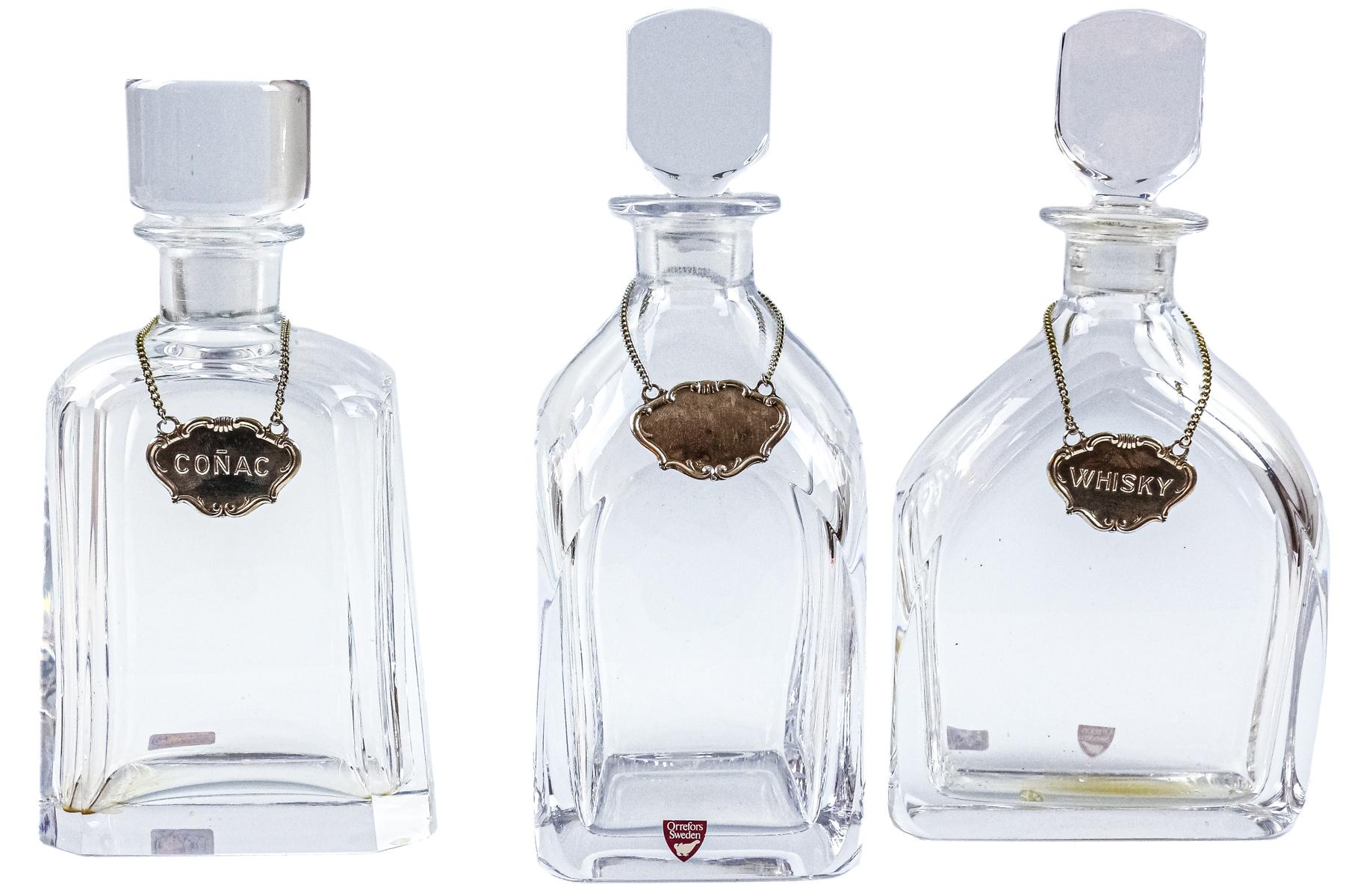 TRES BOTELLAS LICORERAS EN CRISTAL "ORREFORS"