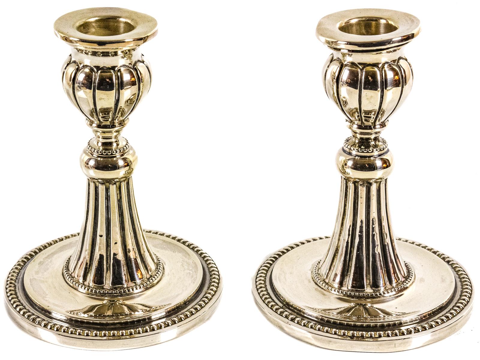 PAREJA DE CANDELEROS EN PLATA DE MEDIADOS DEL S.XX