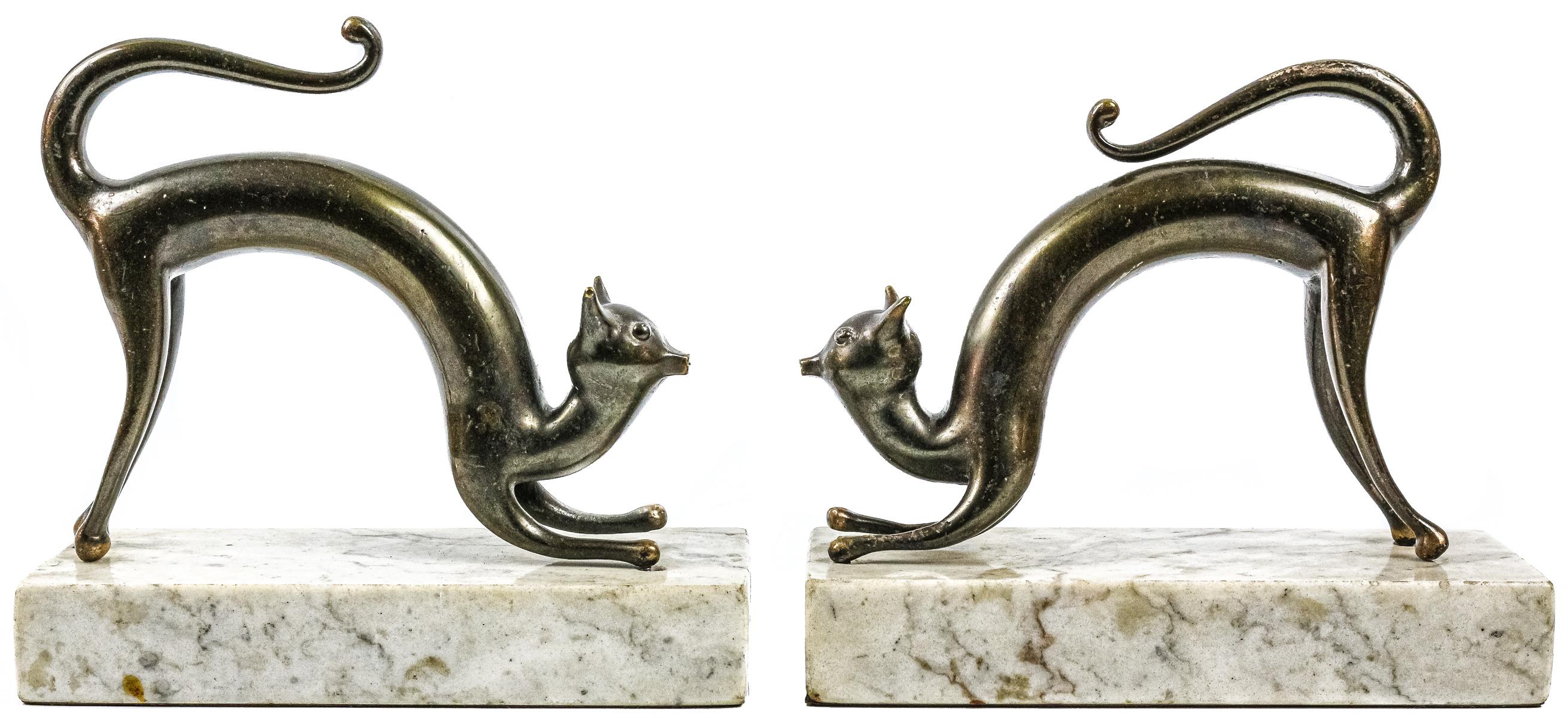 PAREJA DE APOYA LIBROS EN BRONCE DE MEDIADOS DEL S.XX