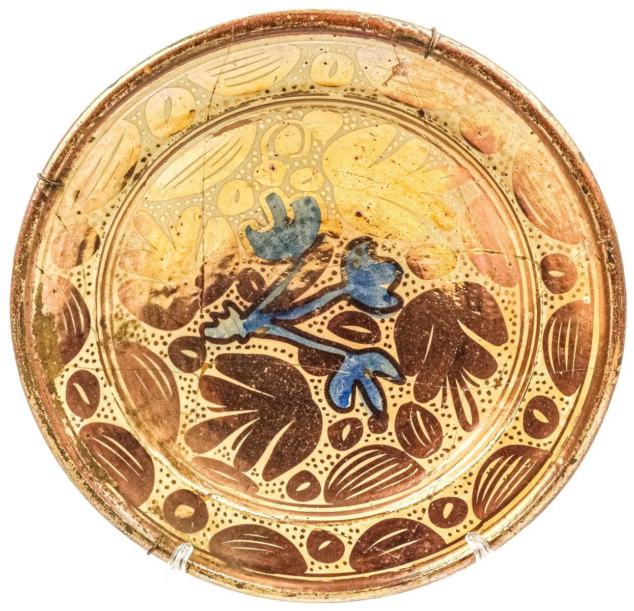 PLATO EN CERÁMICA DE REFLEJOS DEL SIGLO XVIII