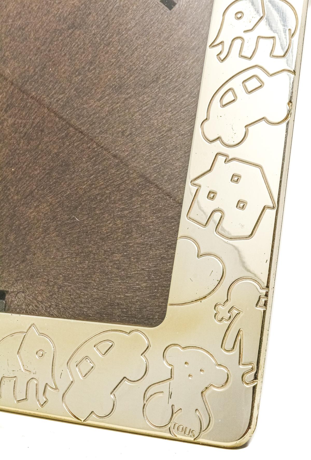 MARCO PORTAFOTOS EN PLATA "TOUS"