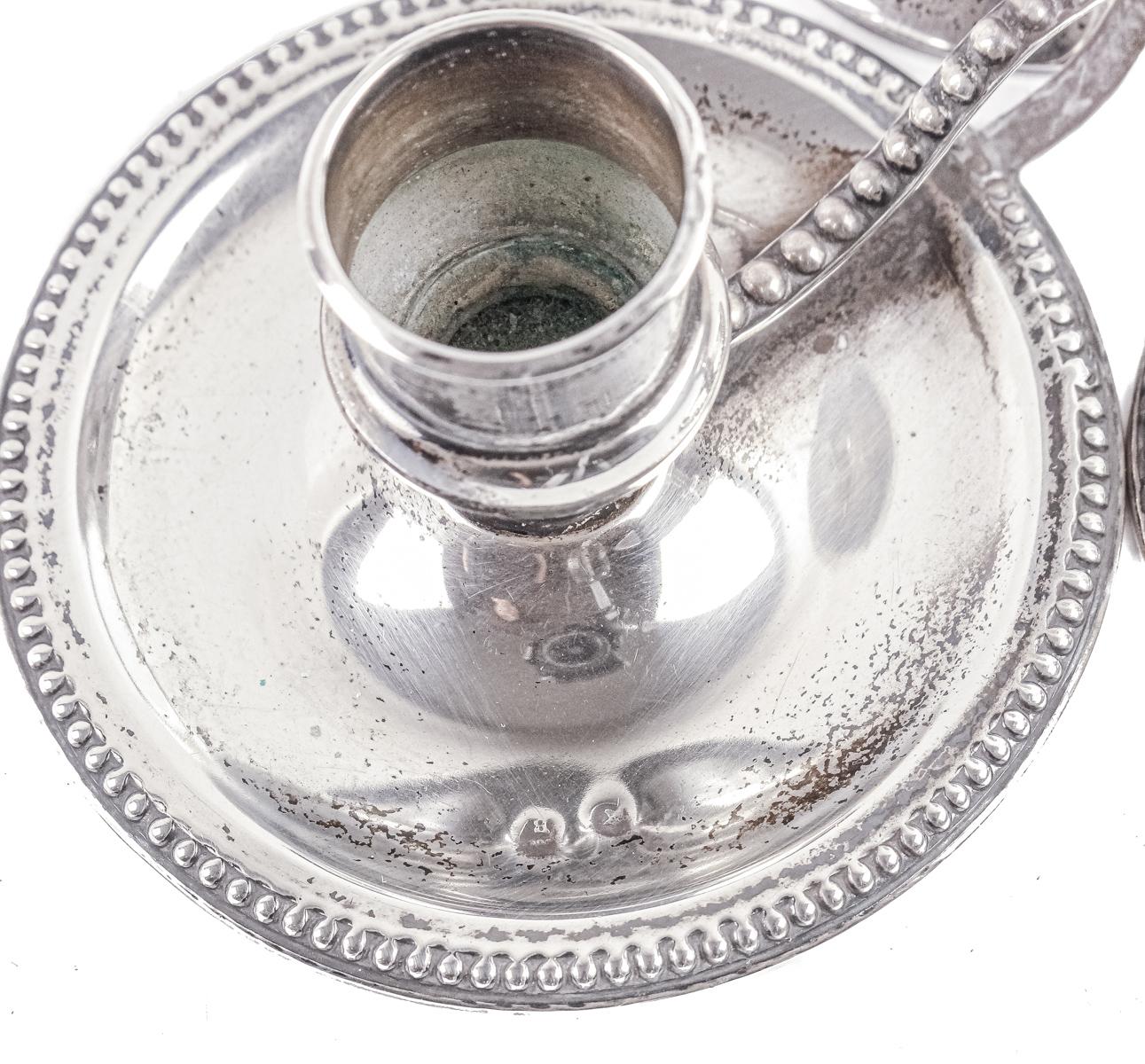 TRES PEQUEÑOS CANDELEROS EN PLATA DE MEDIADOS S.XX