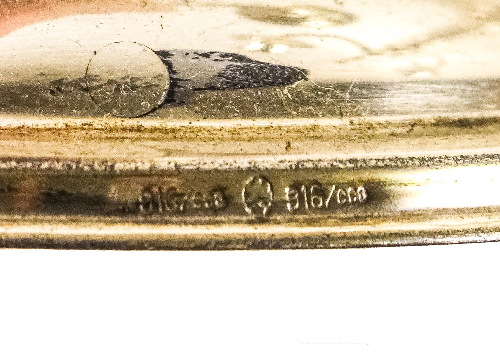 PAREJA DE CANDELABROS EN PLATA DEL PRIMER TERCIO DEL S.XX