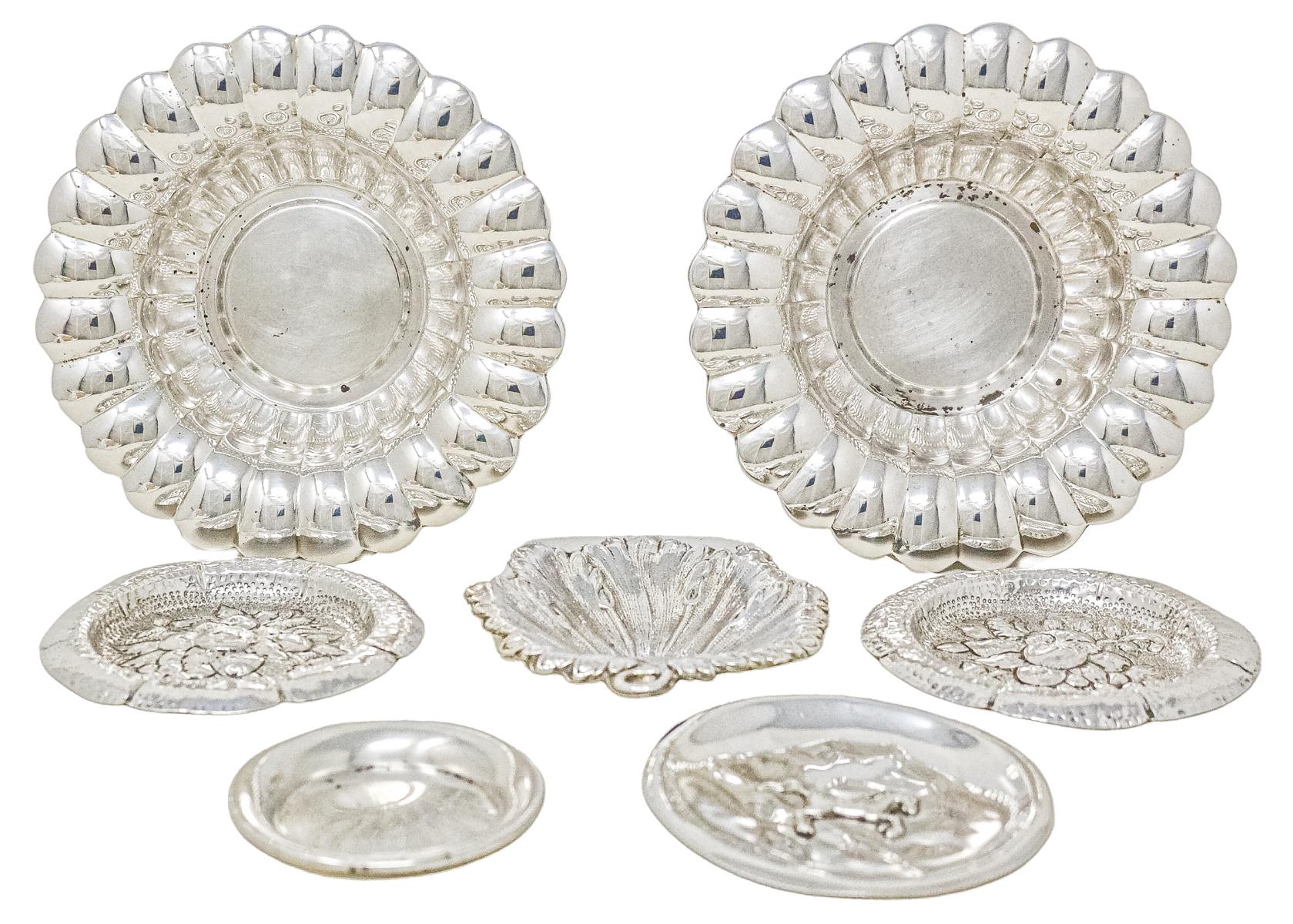 COLECCIÓN DE SIETE CENTRITOS DE PLATA