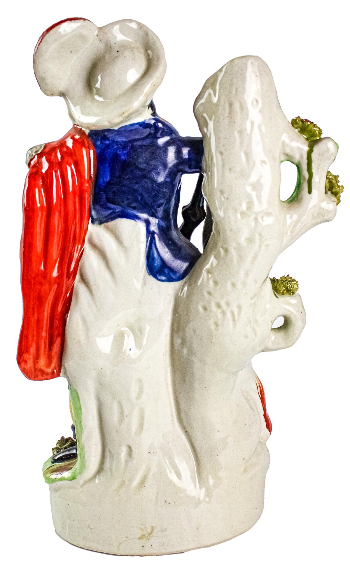 FIGURA DE PORCELANA STAFFORDSHIRE DE MEDIADOS DE S. XX