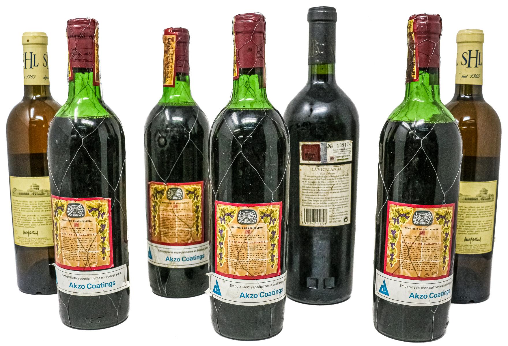 SIETE BOTELLAS DE VINO