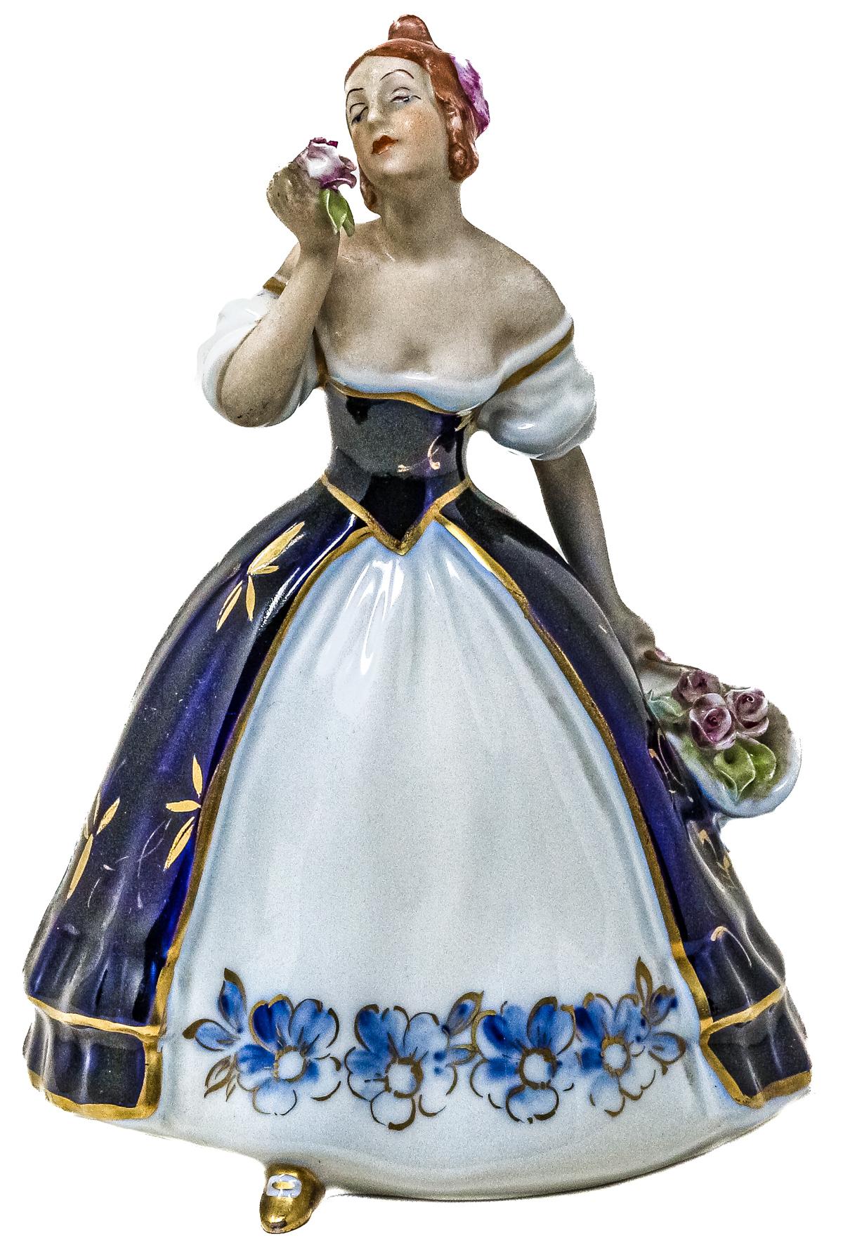 FIGURA EN PORCELANA ROYAL DUX DE MEDIADOS DEL S.XX