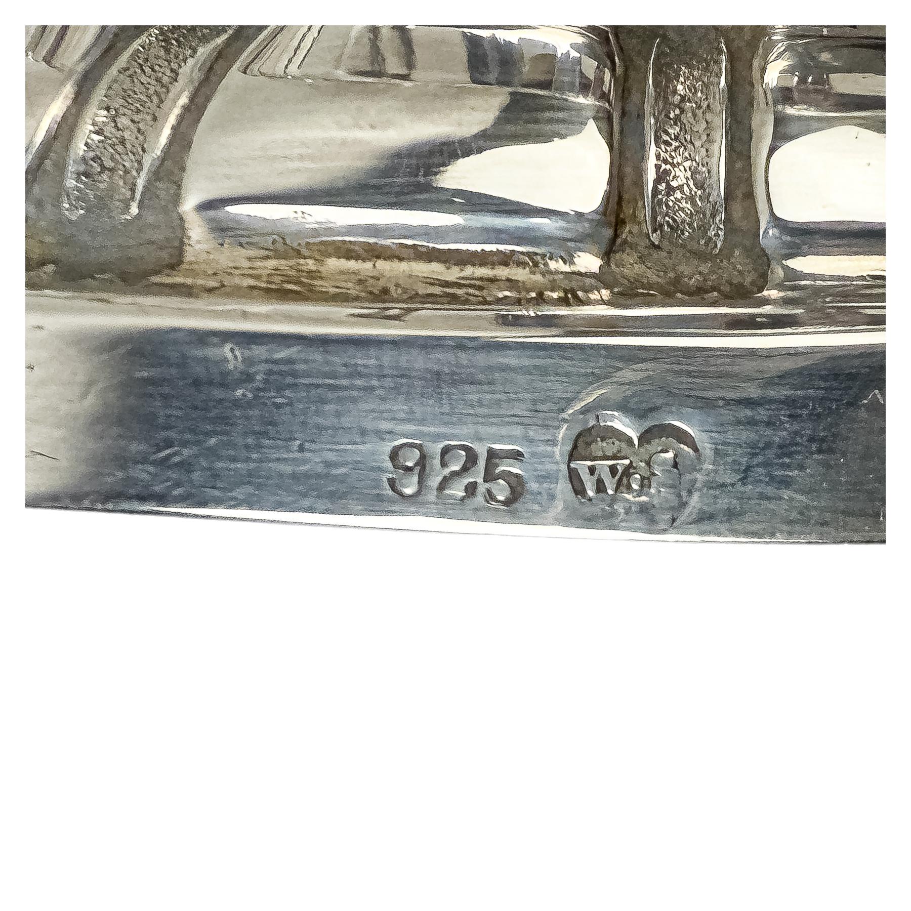 CAMPANITA, CANDELERO Y CENTRITO EN PLATA ÚLTIMO CUARTO S.XX