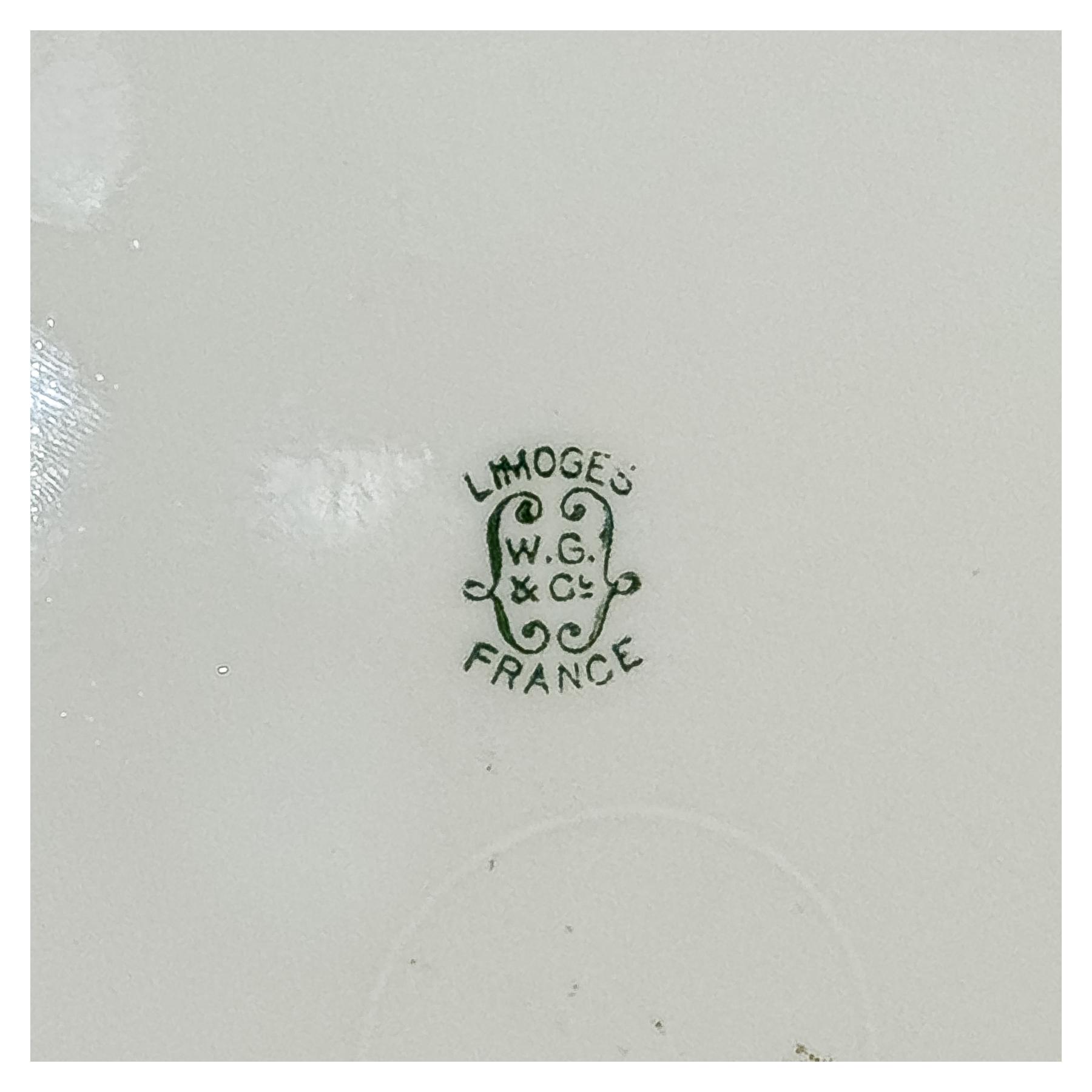 TRES PLATOS DE PORCELANA DE MEDIADOS DEL SIGLO XX
