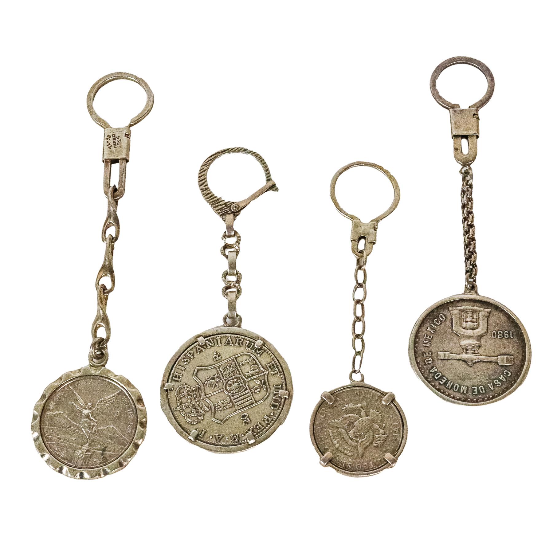 CUATRO LLAVEROS DE PLATA