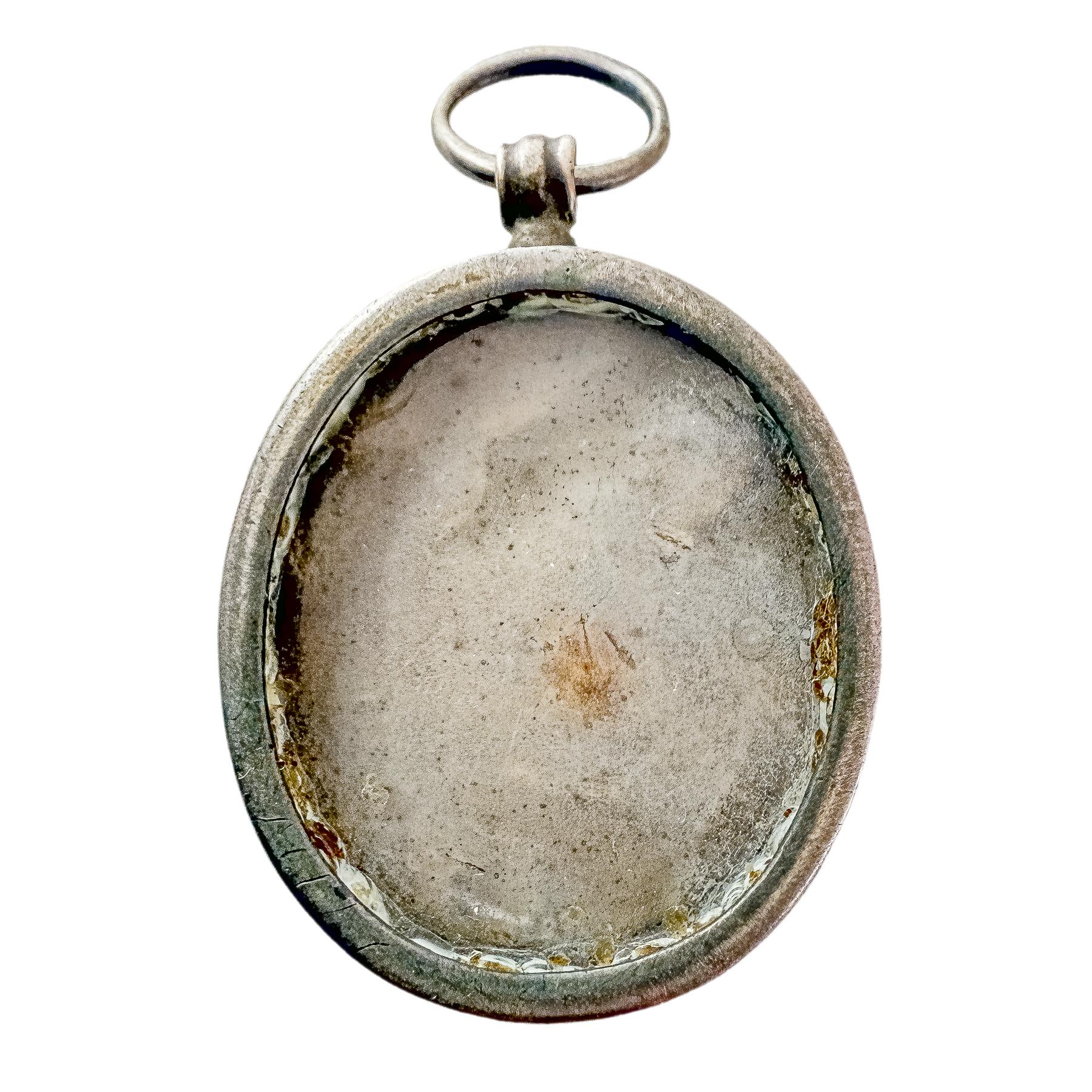 RELICARIO DE PLATA DEL SIGLO XVIII