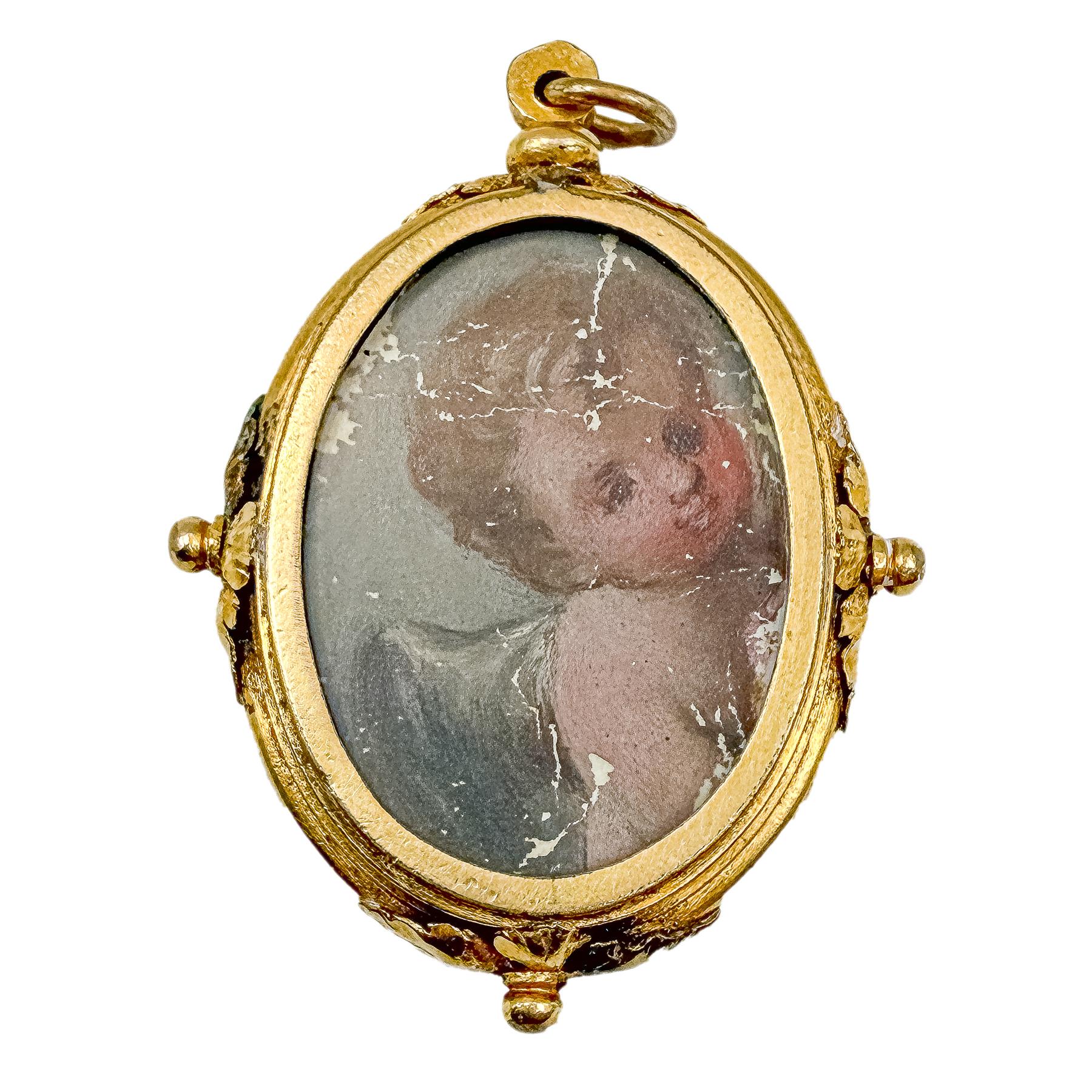 RELICARIO DE METAL SOBREDORADO DEL SIGLO XVIII