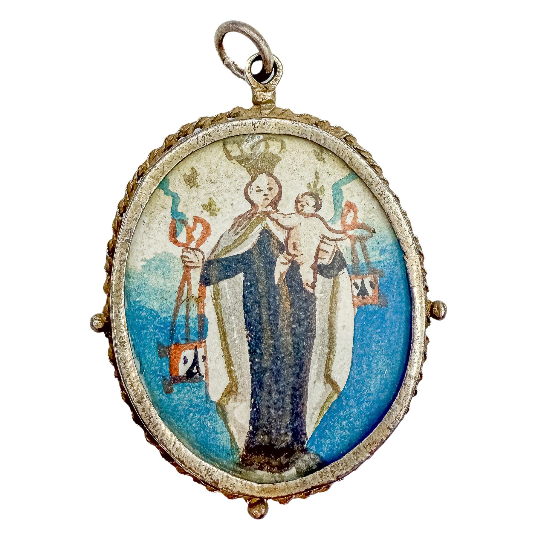 MEDALLÓN DEVOCIONAL DE PLATA DEL SIGLO XVIII