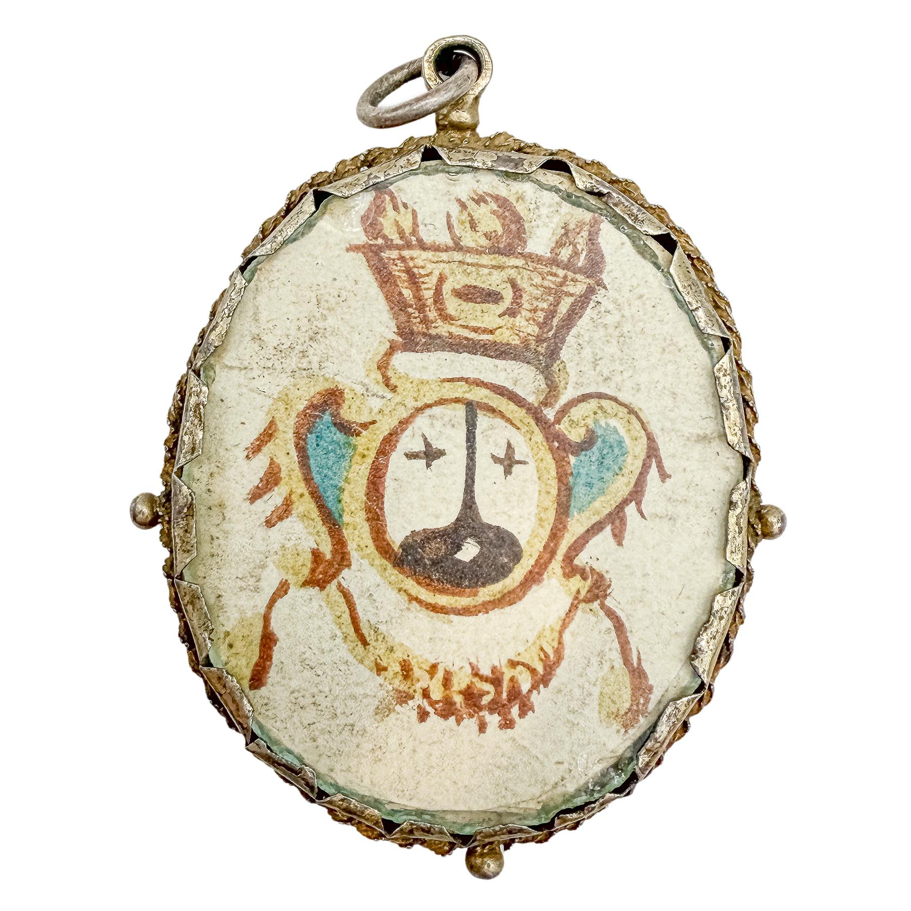 MEDALLÓN DEVOCIONAL DE PLATA DEL SIGLO XVIII