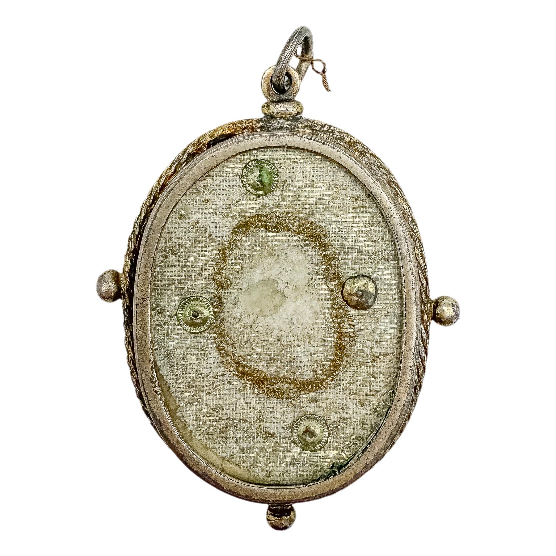 RELICARIO DE PLATA DEL SIGLO XVIII