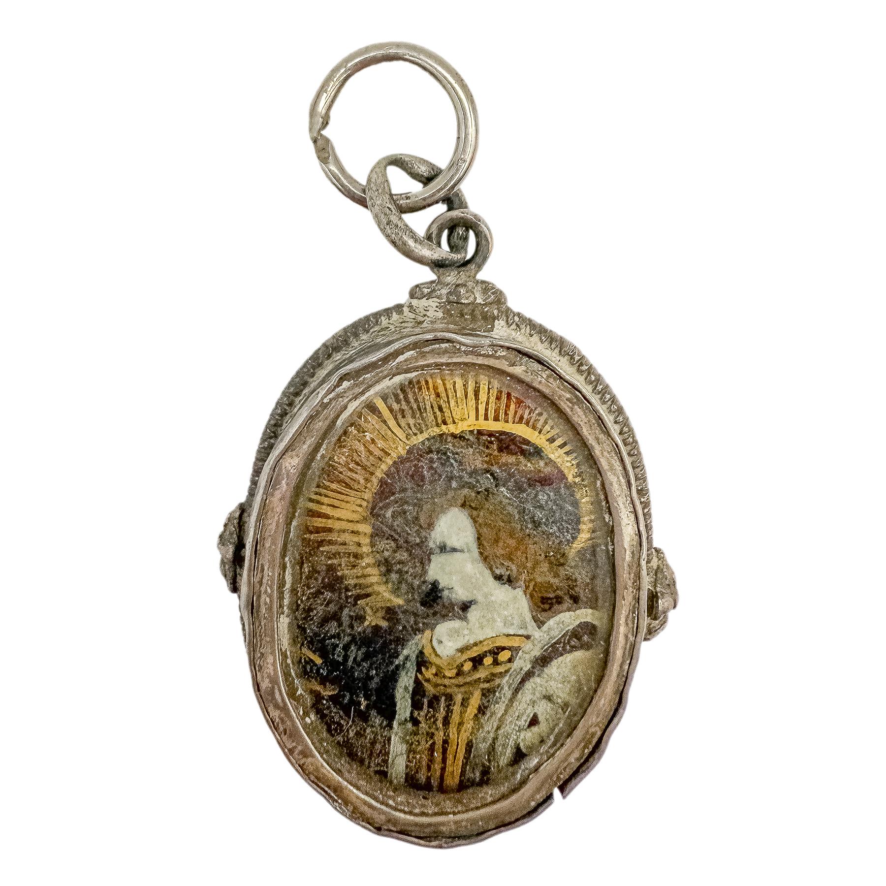 MEDALLÓN DEVOCIONAL DE PLATA DEL SIGLO XVIII