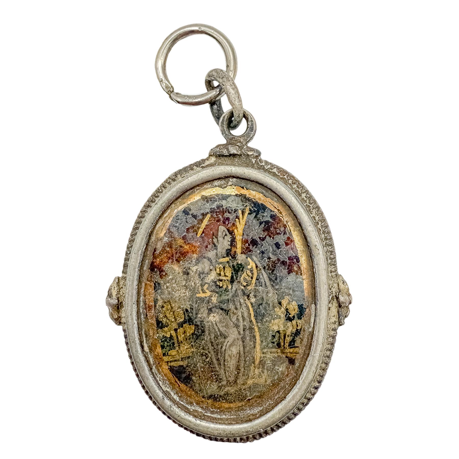 MEDALLÓN DEVOCIONAL DE PLATA DEL SIGLO XVIII