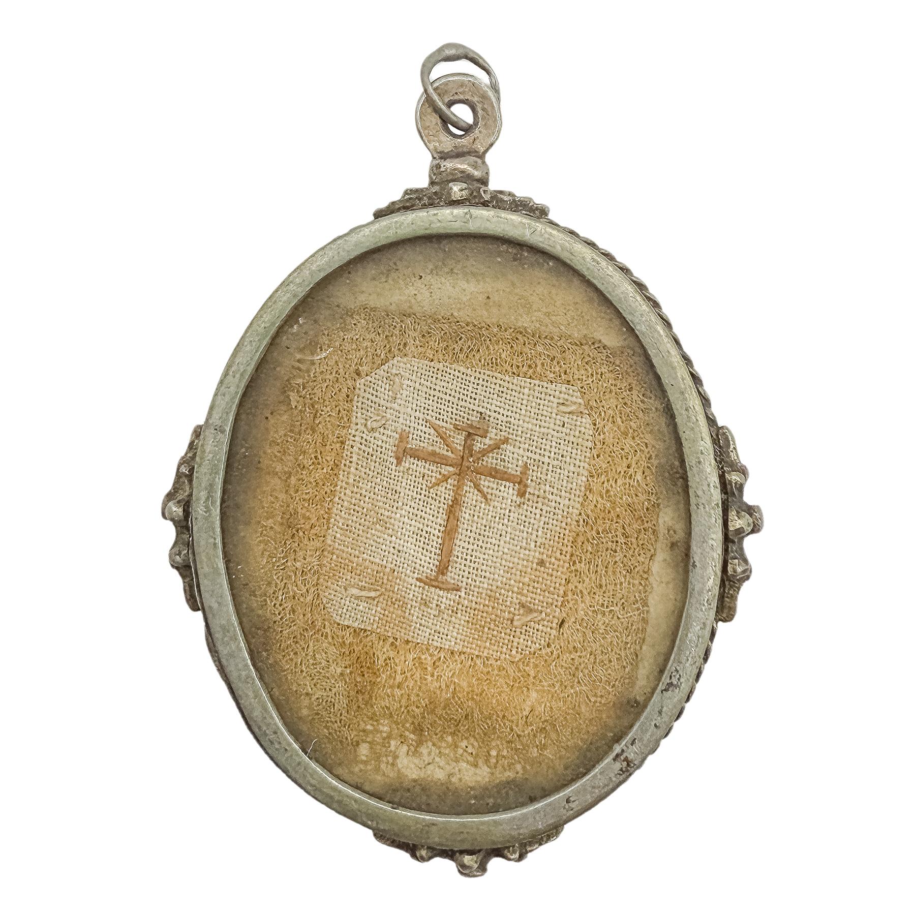 RELICARIO CASTELLANO DE PLATA DEL SIGLO XVIII