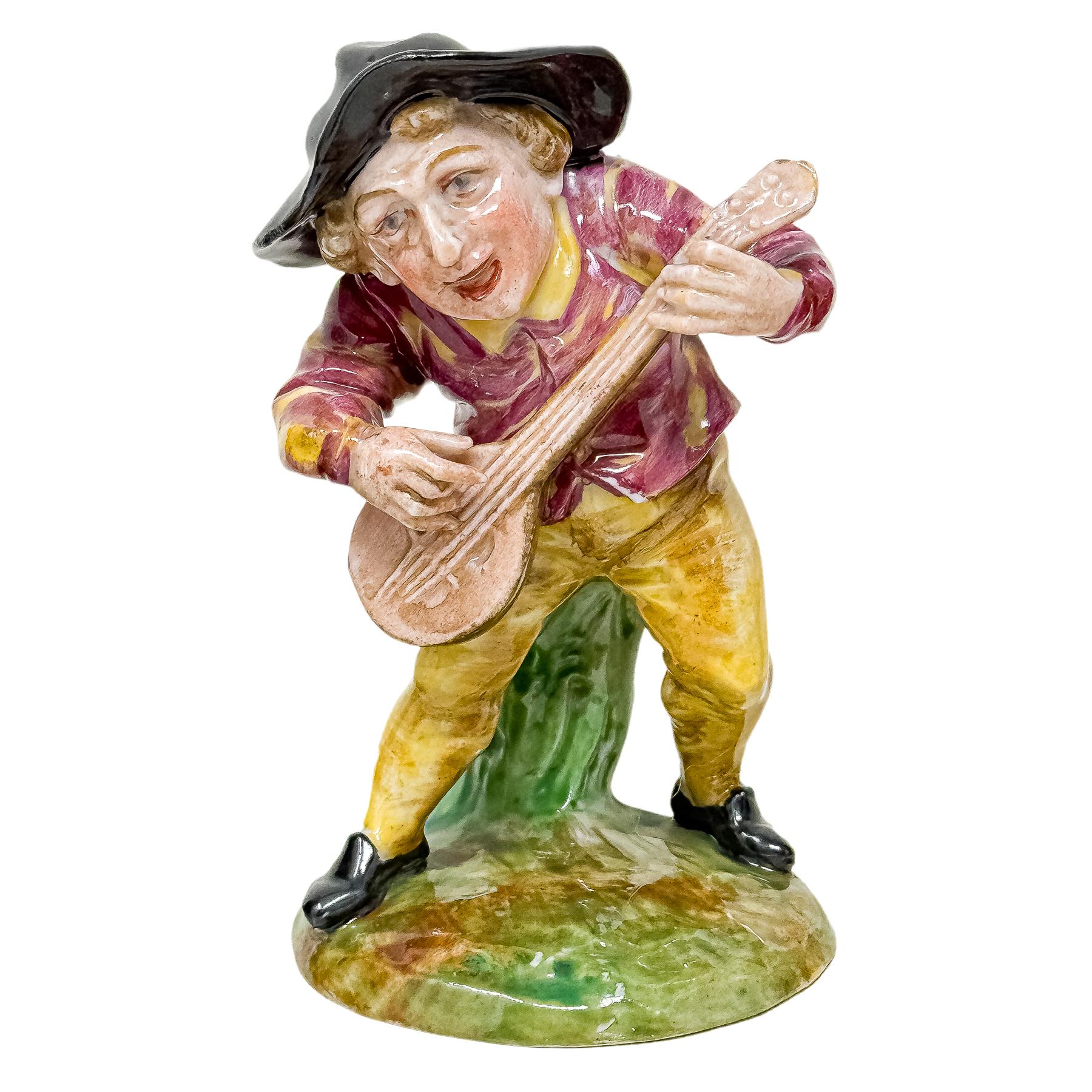 CONJUNTO DE FIGURAS DE PORCELANA “MÚSICOS”. SIGLO XX