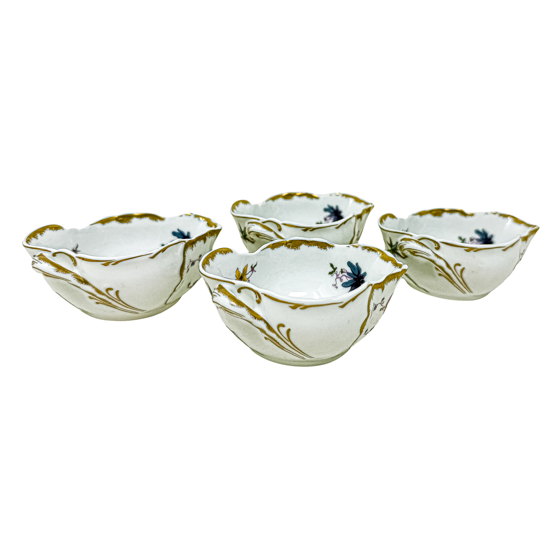 CUATRO ESPECIEROS EN PORCELANA DEL ÚLITMO CUARTO DEL S.XX