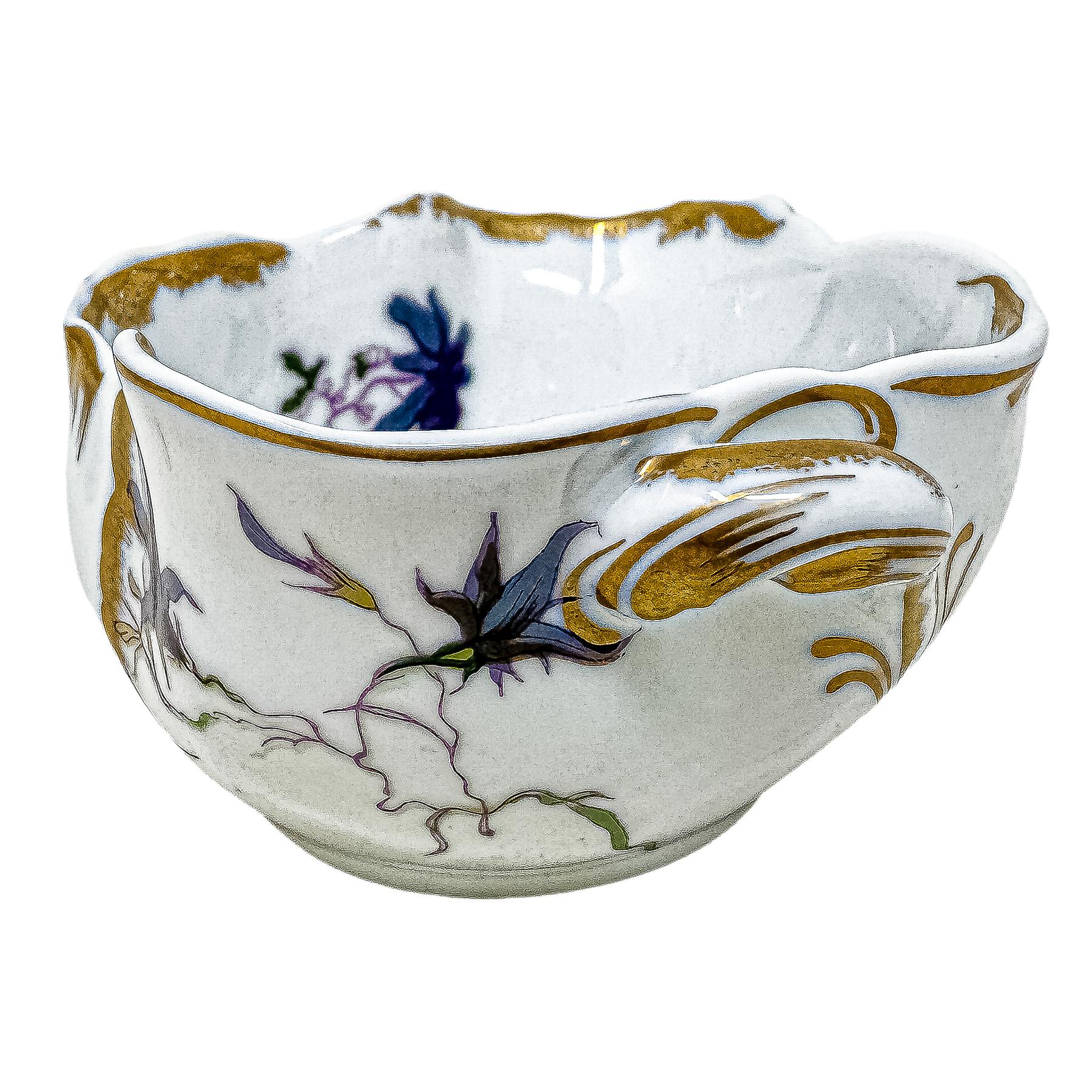 CUATRO ESPECIEROS EN PORCELANA DEL ÚLITMO CUARTO DEL S.XX