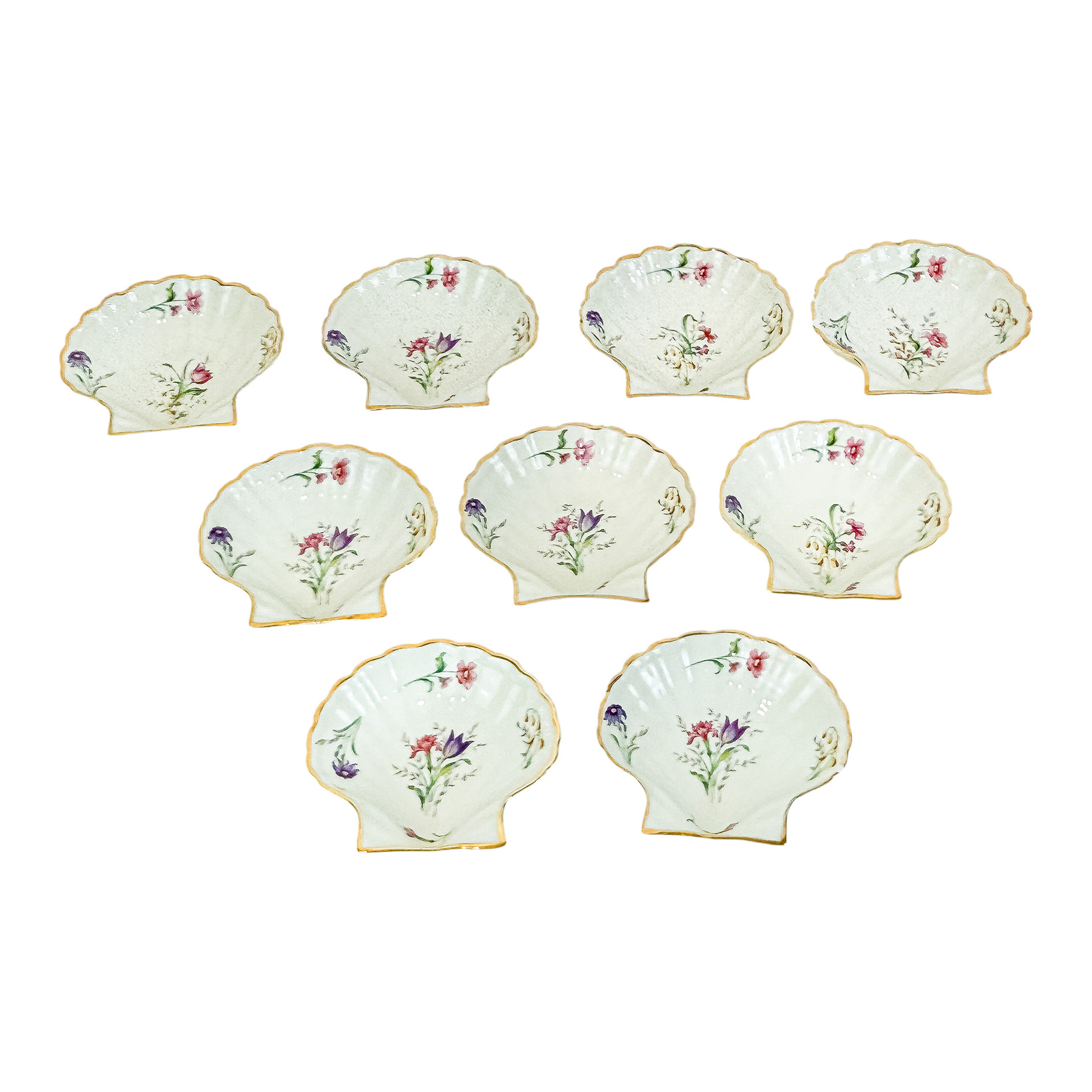 NUEVE RECIPIENTES PARA ENTRANTES EN PORCELANA DE LIMOGES