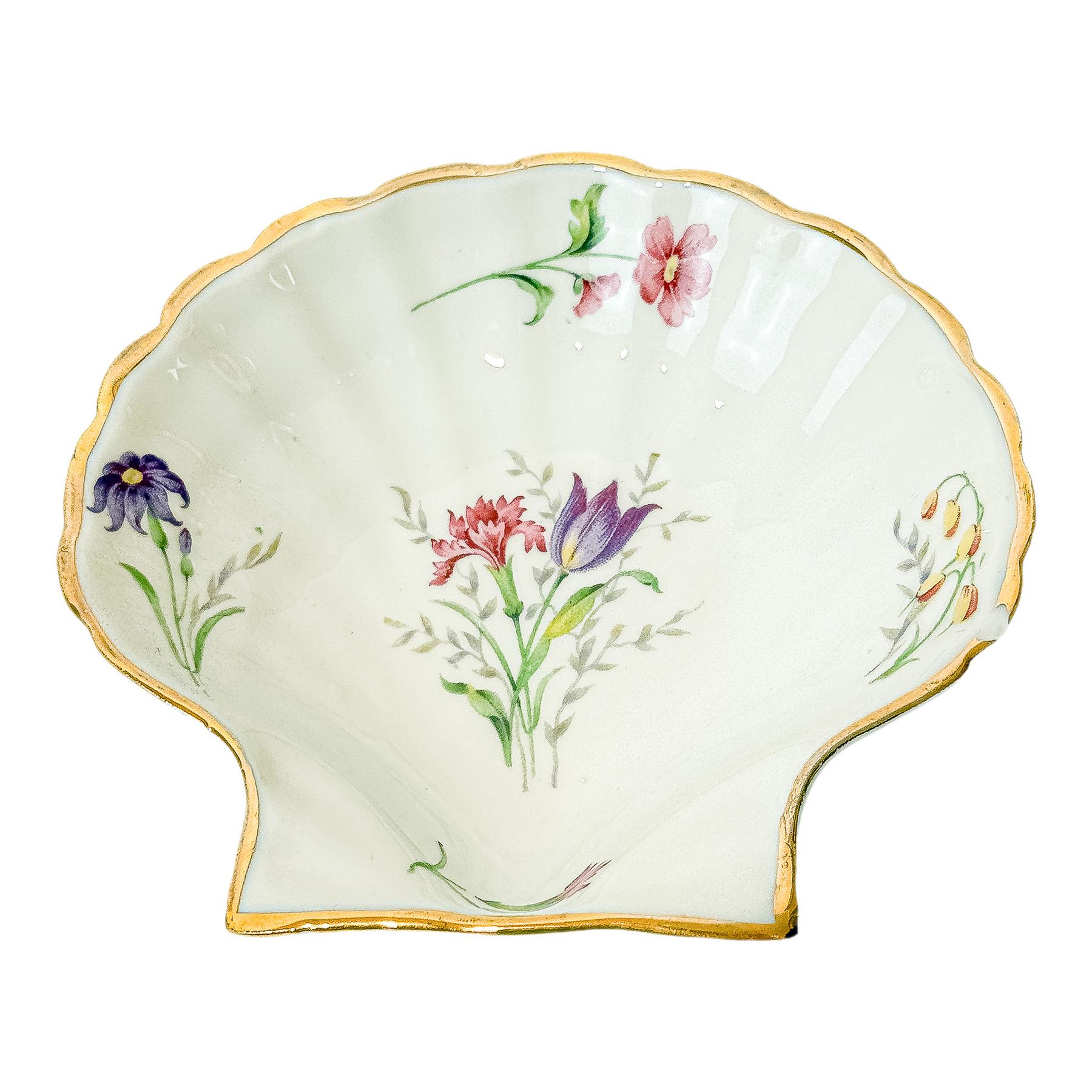 NUEVE RECIPIENTES PARA ENTRANTES EN PORCELANA DE LIMOGES