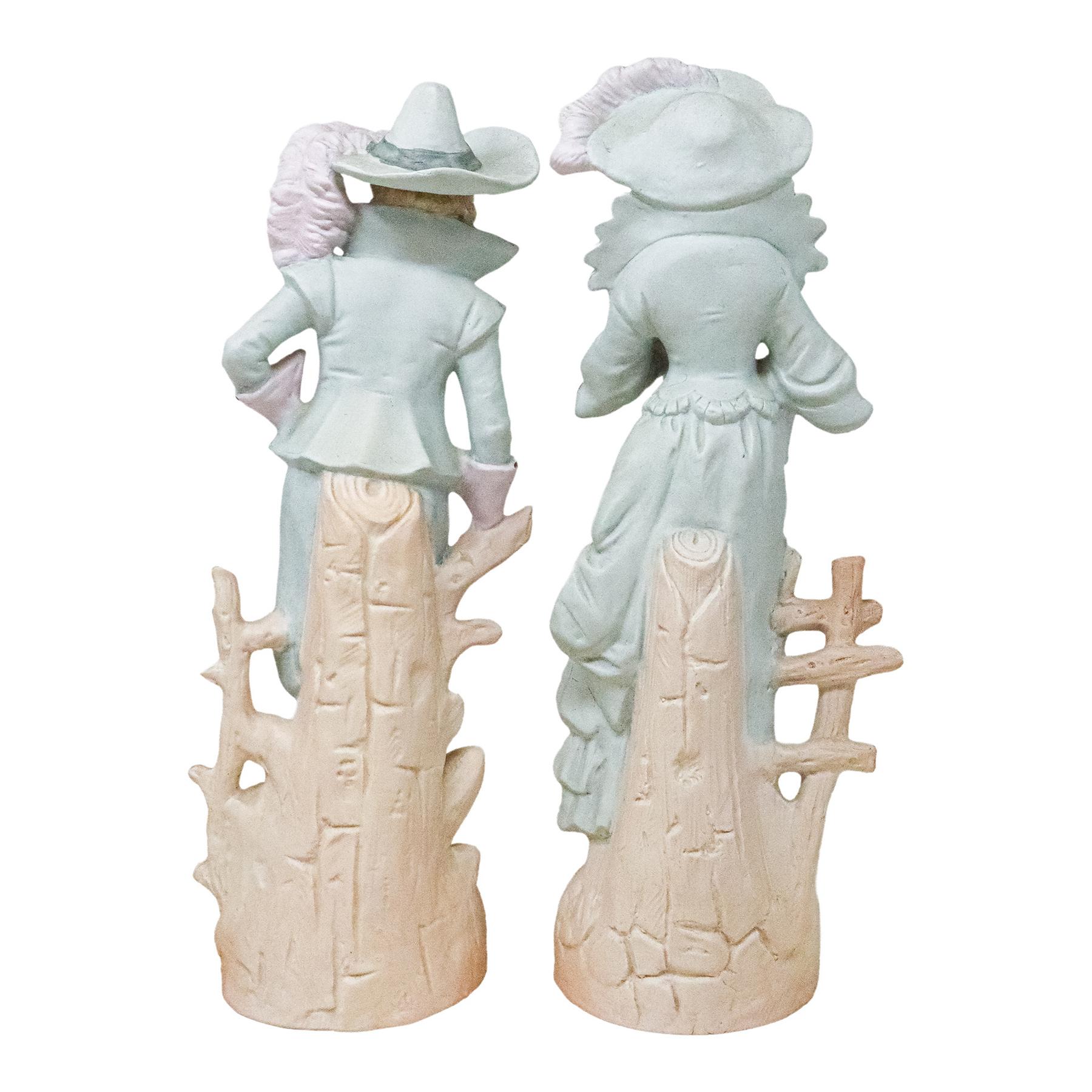 PAREJA DE FIGURAS EN BISCUIT DE PRINCIPIOS DEL S.XX