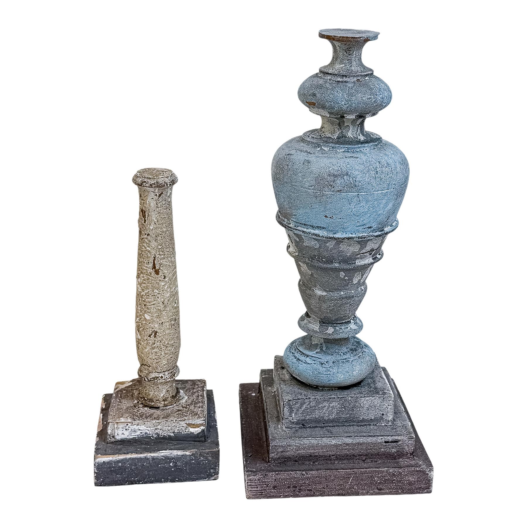 DOS COLUMNAS DE MADERA DEL ÚLTIMO CUARTO DE SIGLO XX