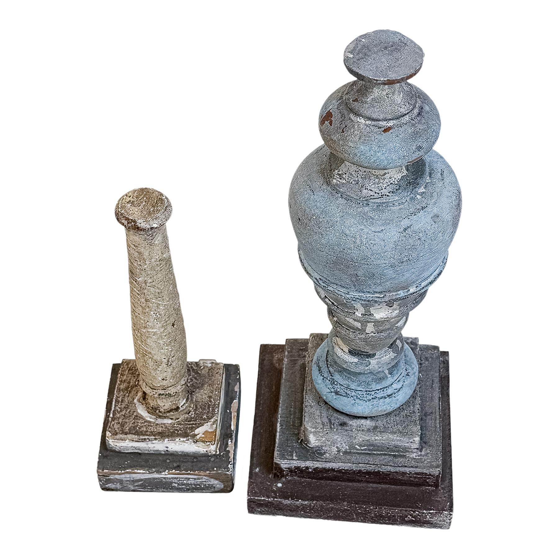 DOS COLUMNAS DE MADERA DEL ÚLTIMO CUARTO DE SIGLO XX