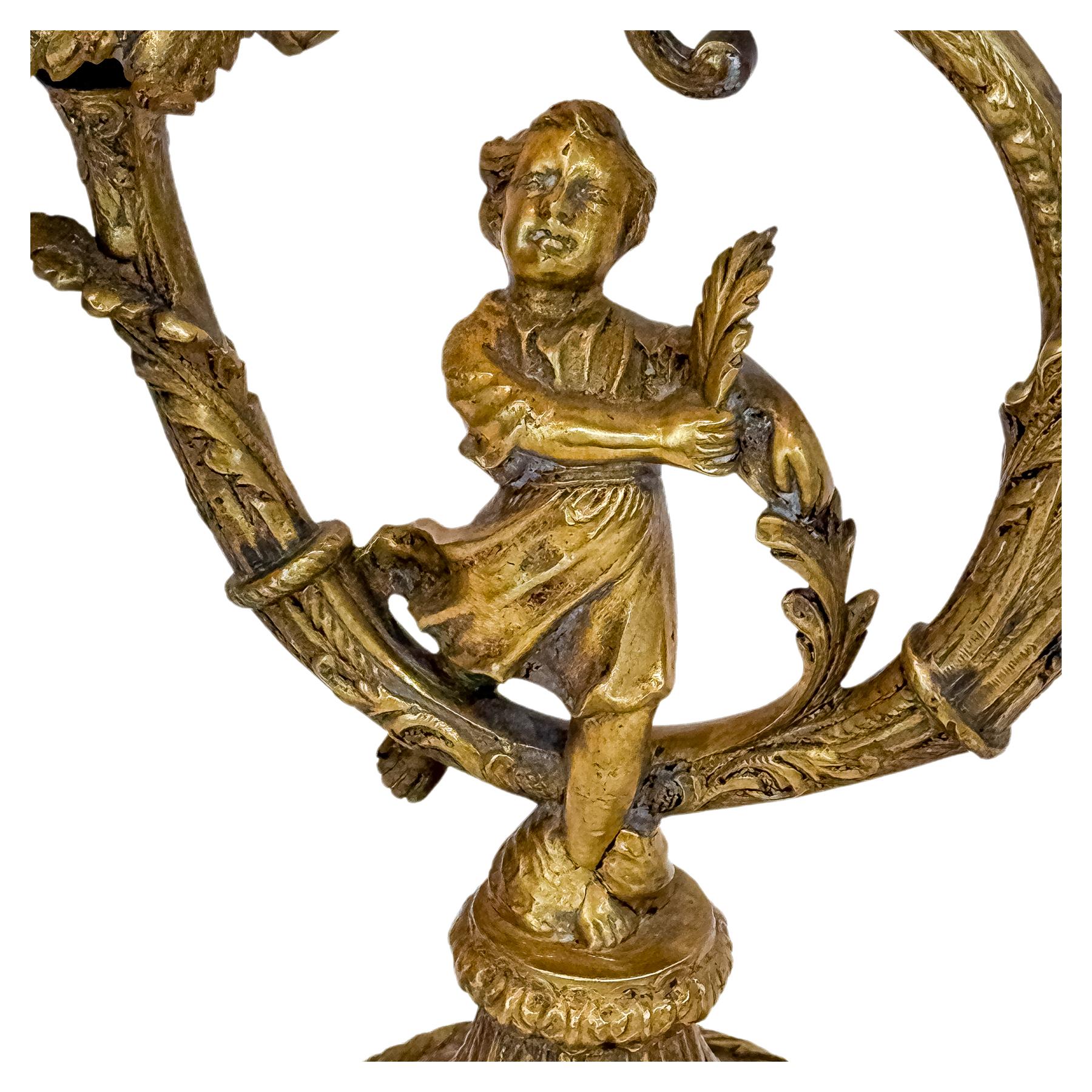 PAREJA DE CANDELEROS EN BRONCE SEGUNDO TERCIO DEL S.XX
