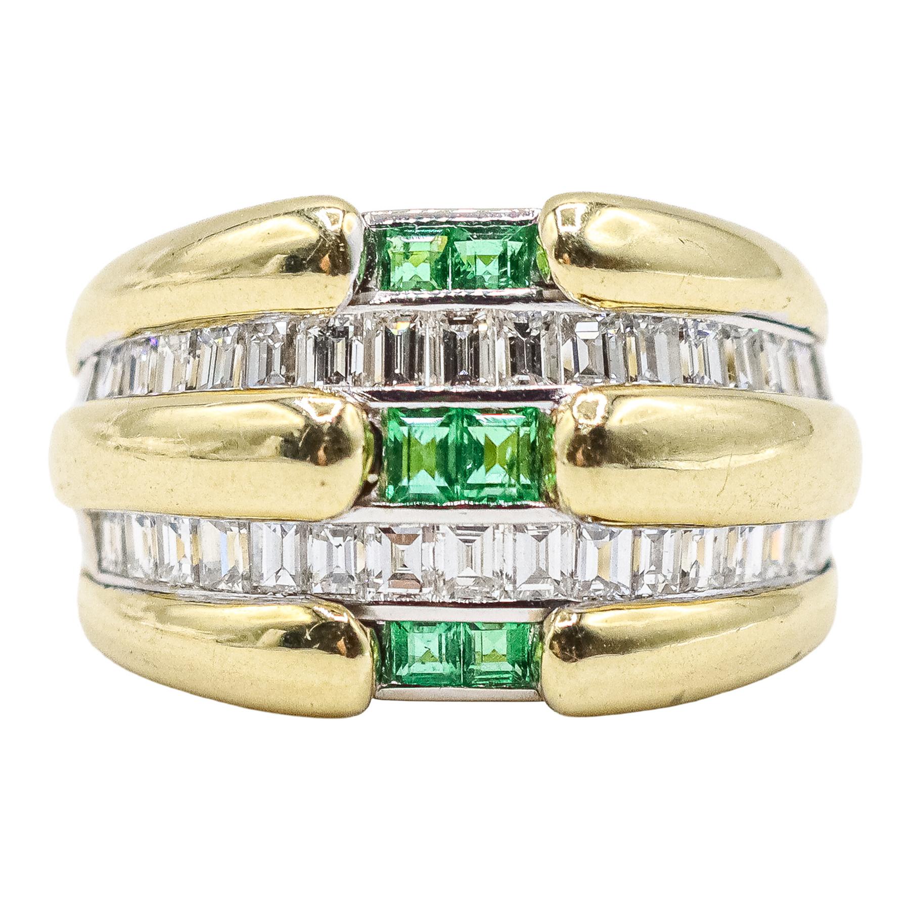 ANILLO ANCHO CON DIAMANTES Y ESMERALDAS