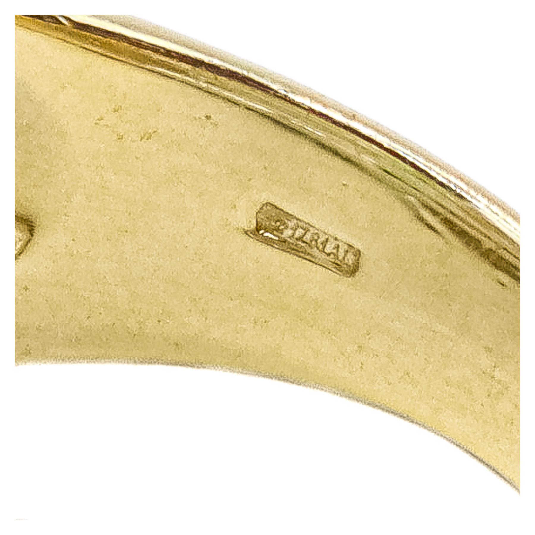 ANILLO ANCHO CON DIAMANTES Y ESMERALDAS