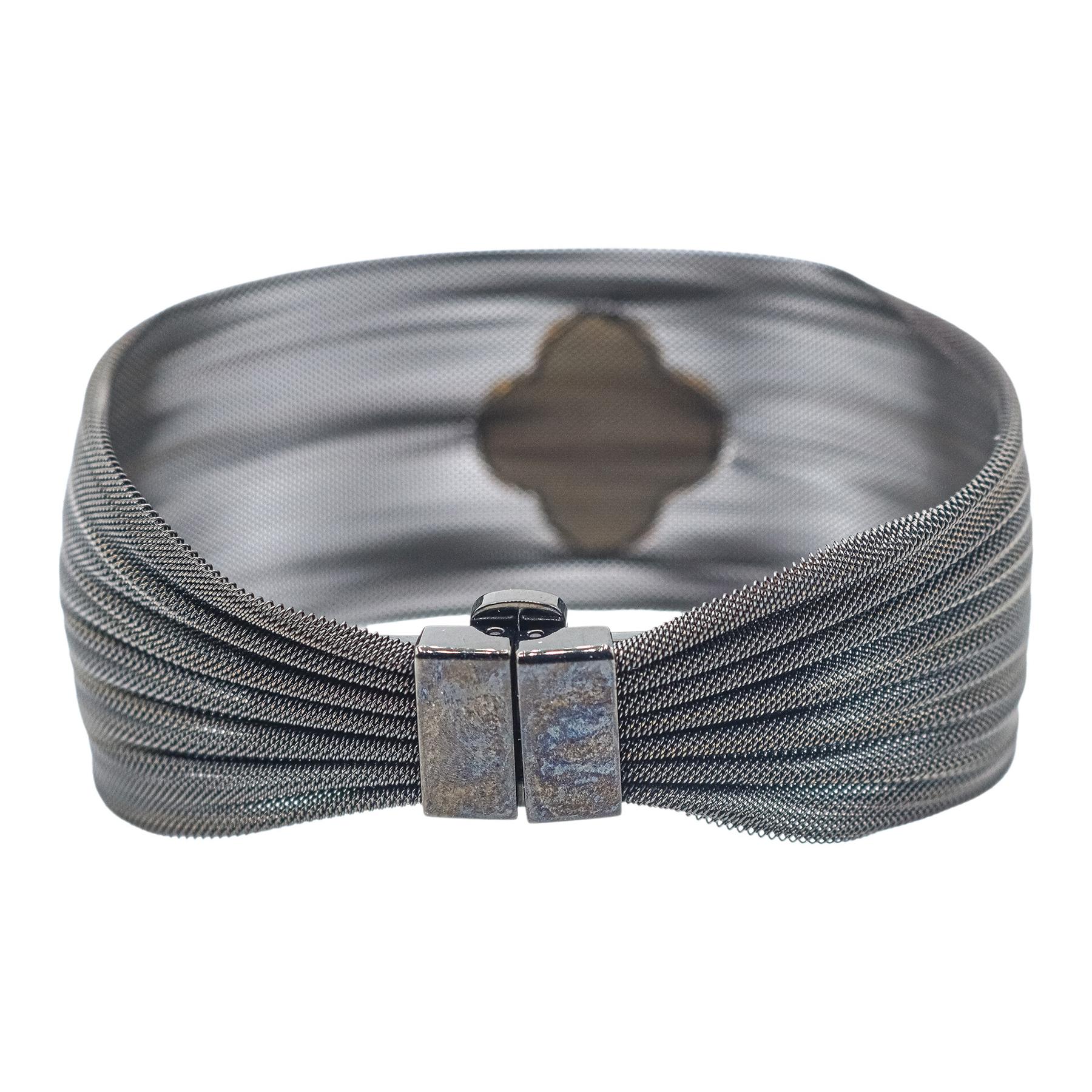 PULSERA ANCHA CON TREBOL DE NÁCAR Y ORO