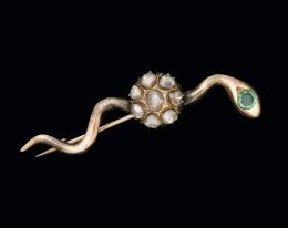 Broche serpiente con esmeralda y diamantes