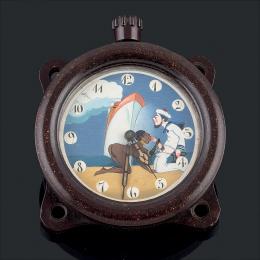 RELOJ DE AVIÓN ERÓTICO, AÑOS 30 Realizado en baquelita con esfera pintada con una escena erótica. Numeración arábiga. Movimiento mecánico manual. Calibre: 4,5cm. En estado de marcha.