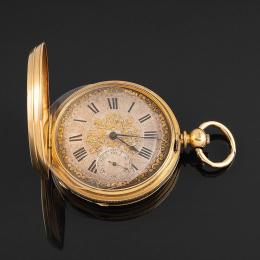 RELOJ SABONETA DE BOLSILLO, S.XIX Realizado en oro amarillo de 18 kt. Tapa superior e inferior con decoración guilloche, y reserva en la parte superior. Firmado "JUAN BENNY LAS PALMAS, GRAN CANARIAS" en el guardapolvo. Esfera plateada con guirnaldas en do