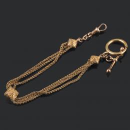 LEONTINA Realizado en metal bañado en oro rosa y amarillo. Formado por cadenitas que se unen en motivos romboidales.