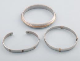 LOTE DE TRES PULSERAS DE ACERO. conjunto de tres pulseras de acero.