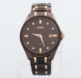 RELOJ CITIZEN EN METAL DORADO Y NEGRO CON CORREA DE METAL ,CITIZEN  NO SE PUEDE COMPROBAR SU FUNCIONAMIENTO,MOVIMIENTO CUARZO. 